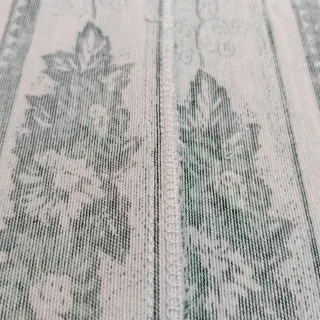 Retal de tela verde y beige.