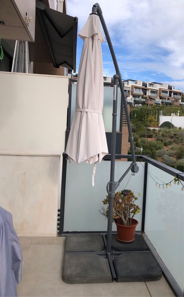 Sombrilla parasol excéntrica