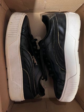 Scarpe Puma Nere e Oro.