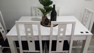 Sofa ,mesa,seis sillas y mesa de centro