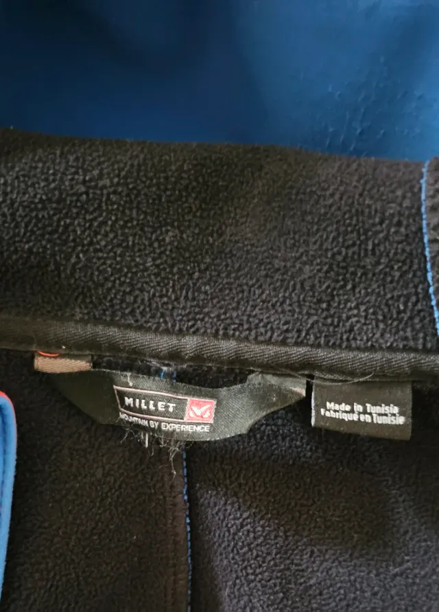 Chaqueta técnica Millet azul y roja