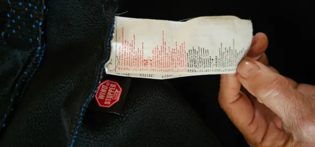 Chaqueta técnica Millet azul y roja