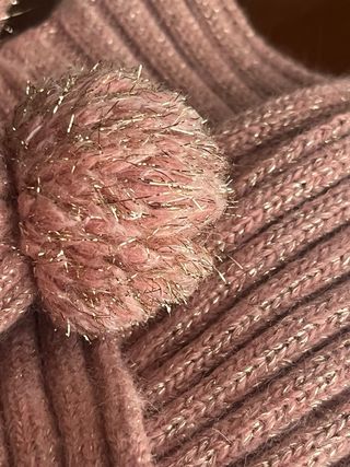 Bufanda Bóboli rosa con pompones impecable