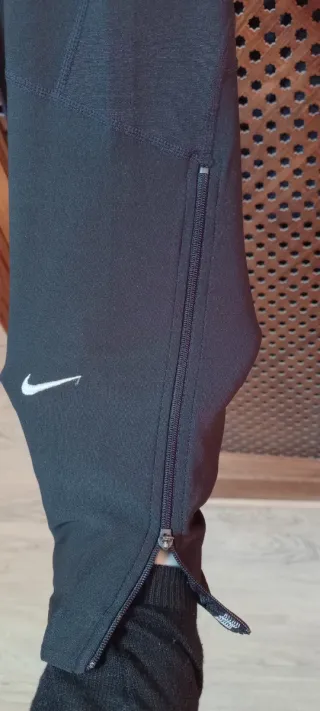 Pantalones largos running Nike negros