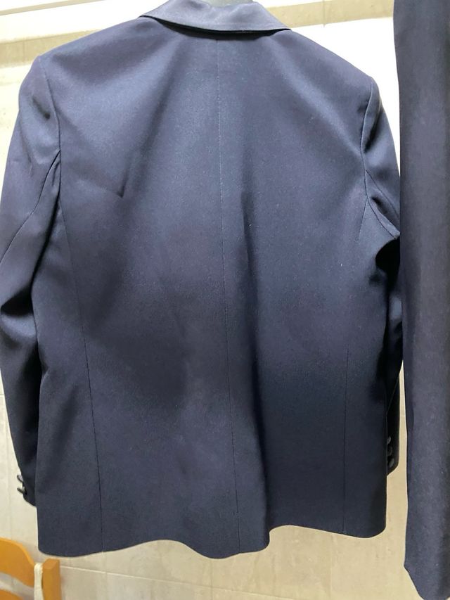 Traje chaqueta y falda azul