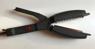 Plancha de pelo negra