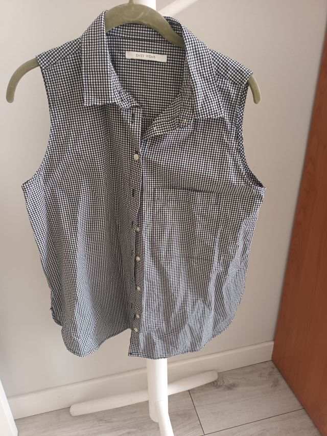 Blusa sin mangas cuadros blanco y negro