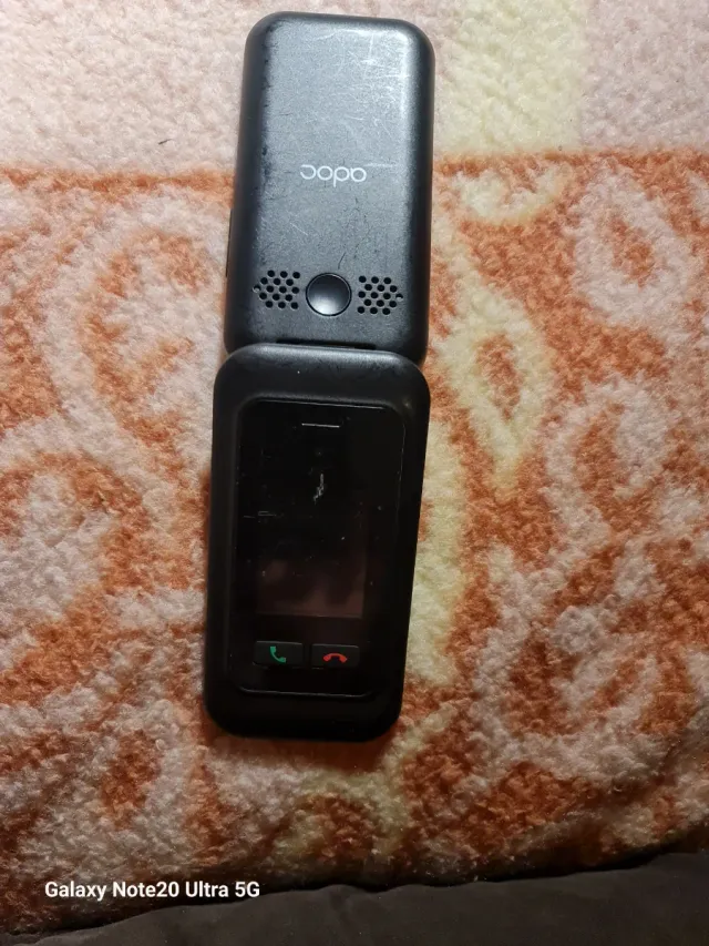 Teléfono móvil adoc tapa negro