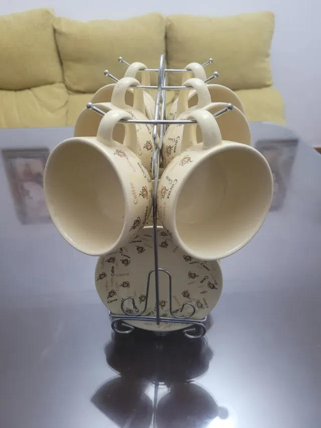 Set di tazze da caffè con supporto e poco uso