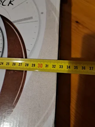 Reloj de pared con termómetro y higrómetro