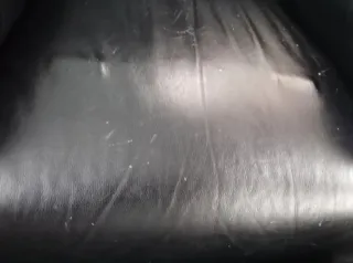 Sillón reclinable de piel negro