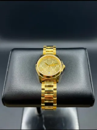 Nuovo orologio in oro da donna Gucci G-timeless