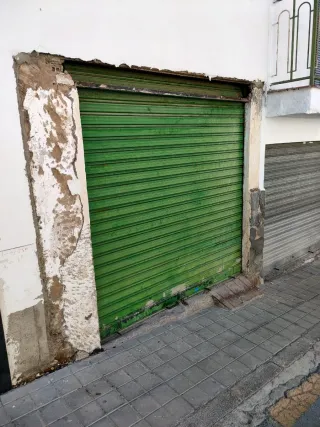 Persiana enrollable de hierro verde