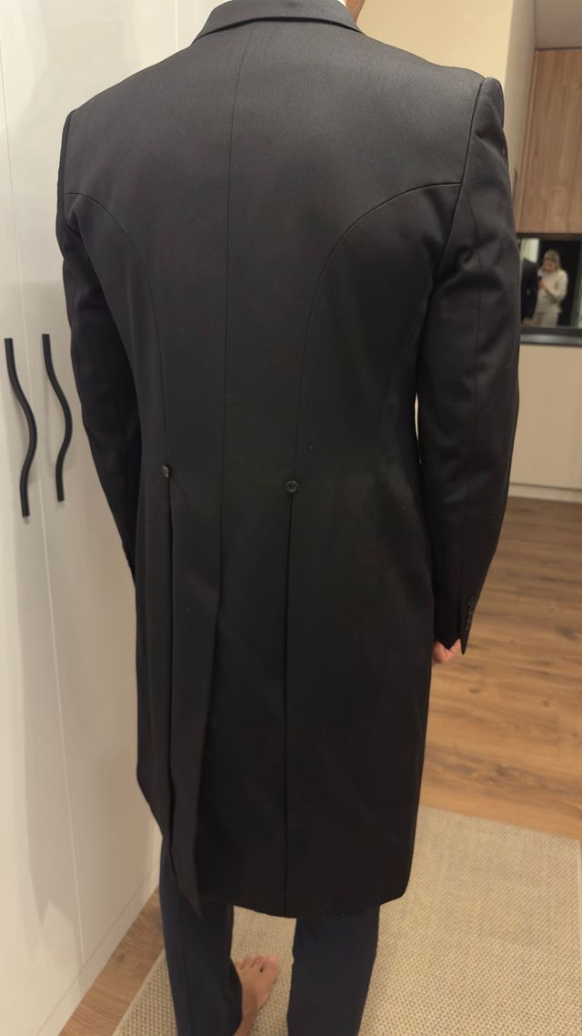 Chaqué negro hombre