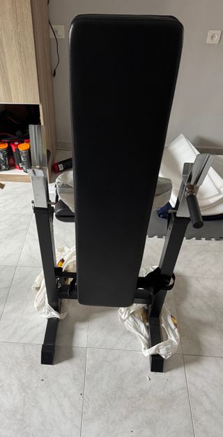 Banco de pesas plegable.