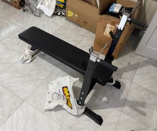 Banco de pesas plegable.