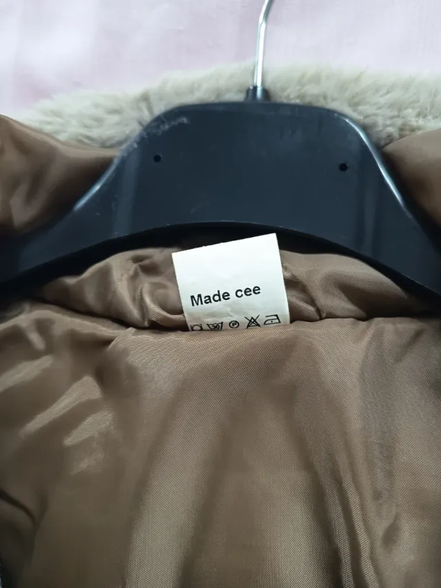 Abrigo niña peluche marrón lazo