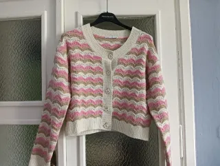 Cardigan corto panna e rosa
