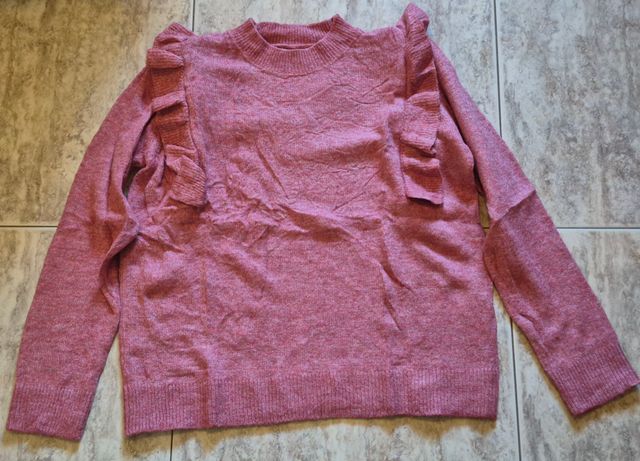 Jersey punto rosa con volantes