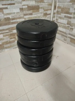 Barra de pesas con discos