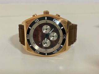 Reloj unisex Caravelle New York Dorado y Marrón