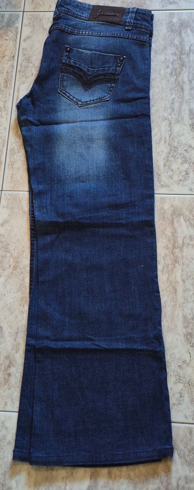 Pantalón tejano acampanado