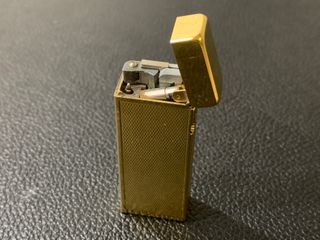 Accendino Dunhill Rollagas anni '70 color oro