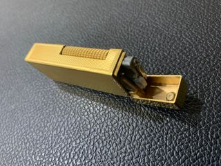 Accendino Dunhill Rollagas anni '70 color oro