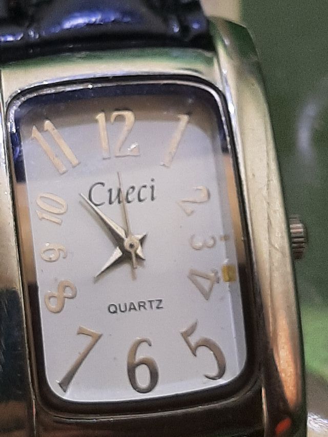 Reloj Cueci Cuarzo Dorado y Plateado