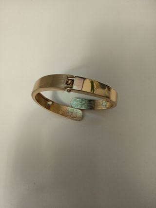 Pulsera rígida dorada Parfois