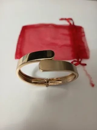 Pulsera rígida dorada Parfois