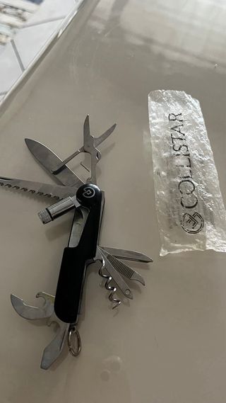 Coltellino multiuso Collistar 11 pezzi con torcia 