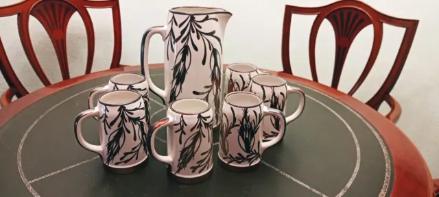 Set di caraffa e 6 barattoli in argento,