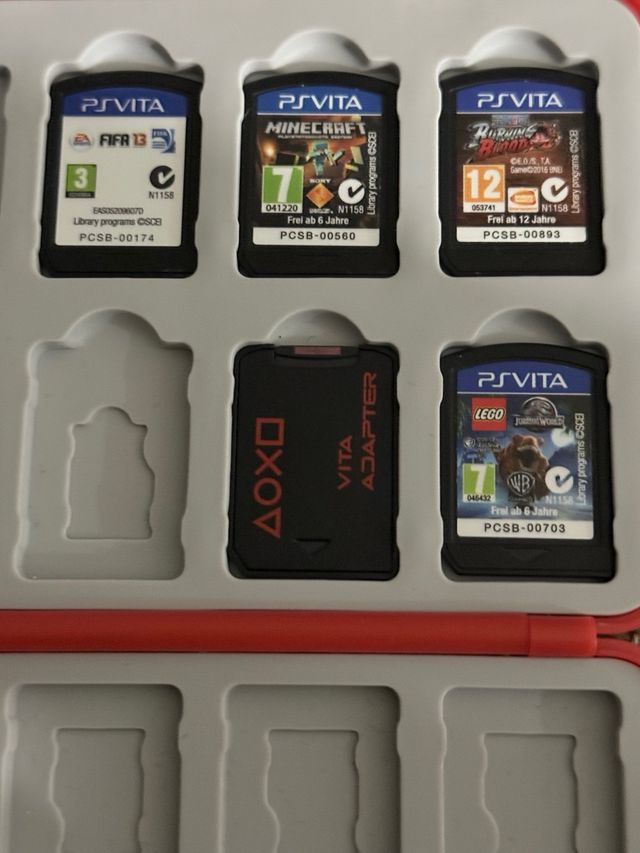 PS Vita Negra + 4 Juegos + Adaptador