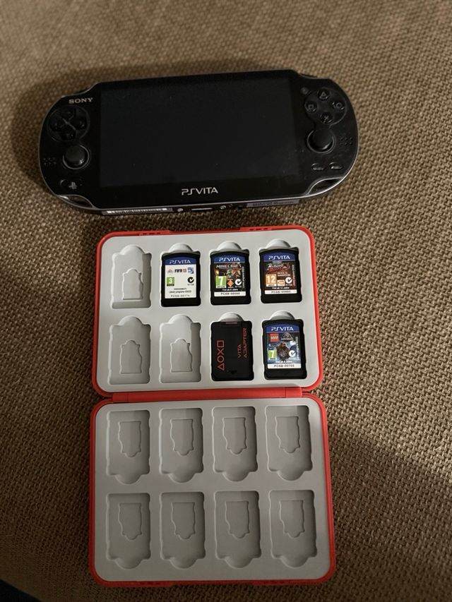PS Vita Negra + 4 Juegos + Adaptador