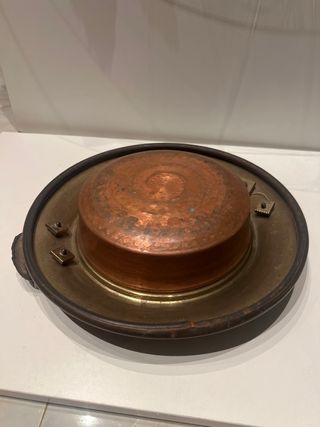 Bracere antico in rame e ottone