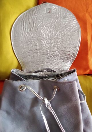 Zainetto in pelle col. lilla fatto a mano