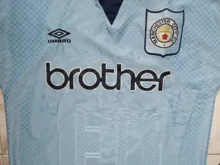 Camiseta Manchester City Umbro Azul