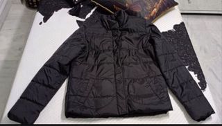 Chaqueta acolchada negra niño