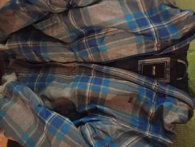 Cazadora Rip Curl azul y gris