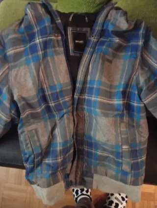 Cazadora Rip Curl azul y gris