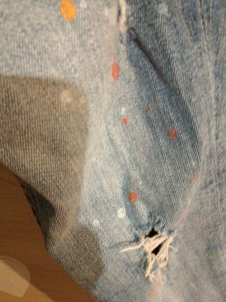 Jeans bambina strappati con macchie