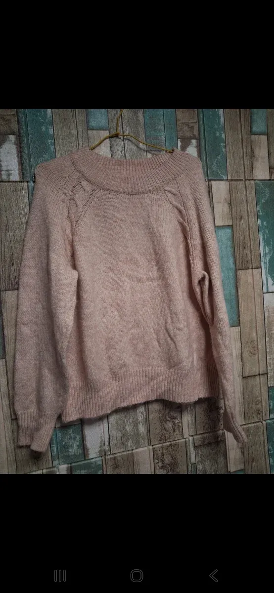 Jersey rosa con trenzas