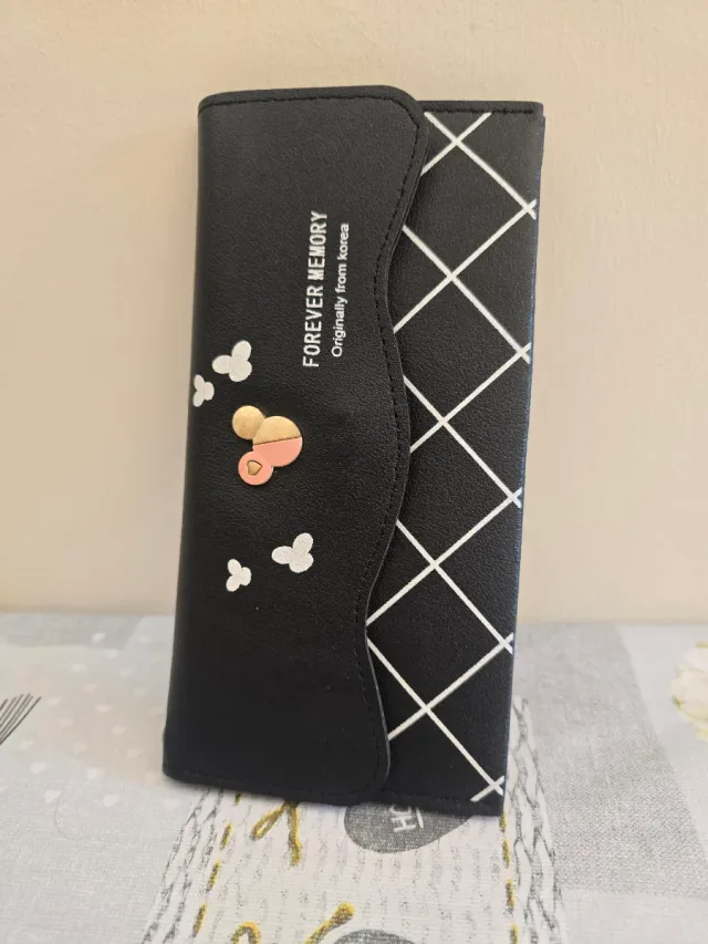 Cartera monedero.CON ETIQUETA.7,80 EUROS