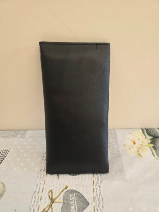 Cartera monedero.CON ETIQUETA.7,80 EUROS