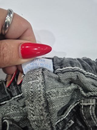 Jeans bimbo grigio effetto stone washed 6/9 mesi