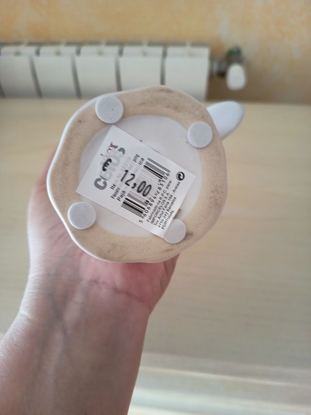 Figura pájaro cerámica blanco y dorado