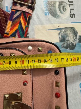 Pochette rosa con tracolla colorata