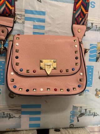 Pochette rosa con tracolla colorata