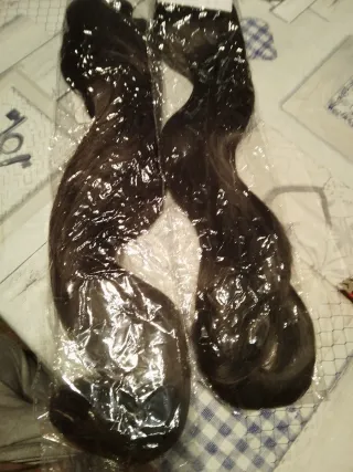 Extensiones de cabello ondulado castaño